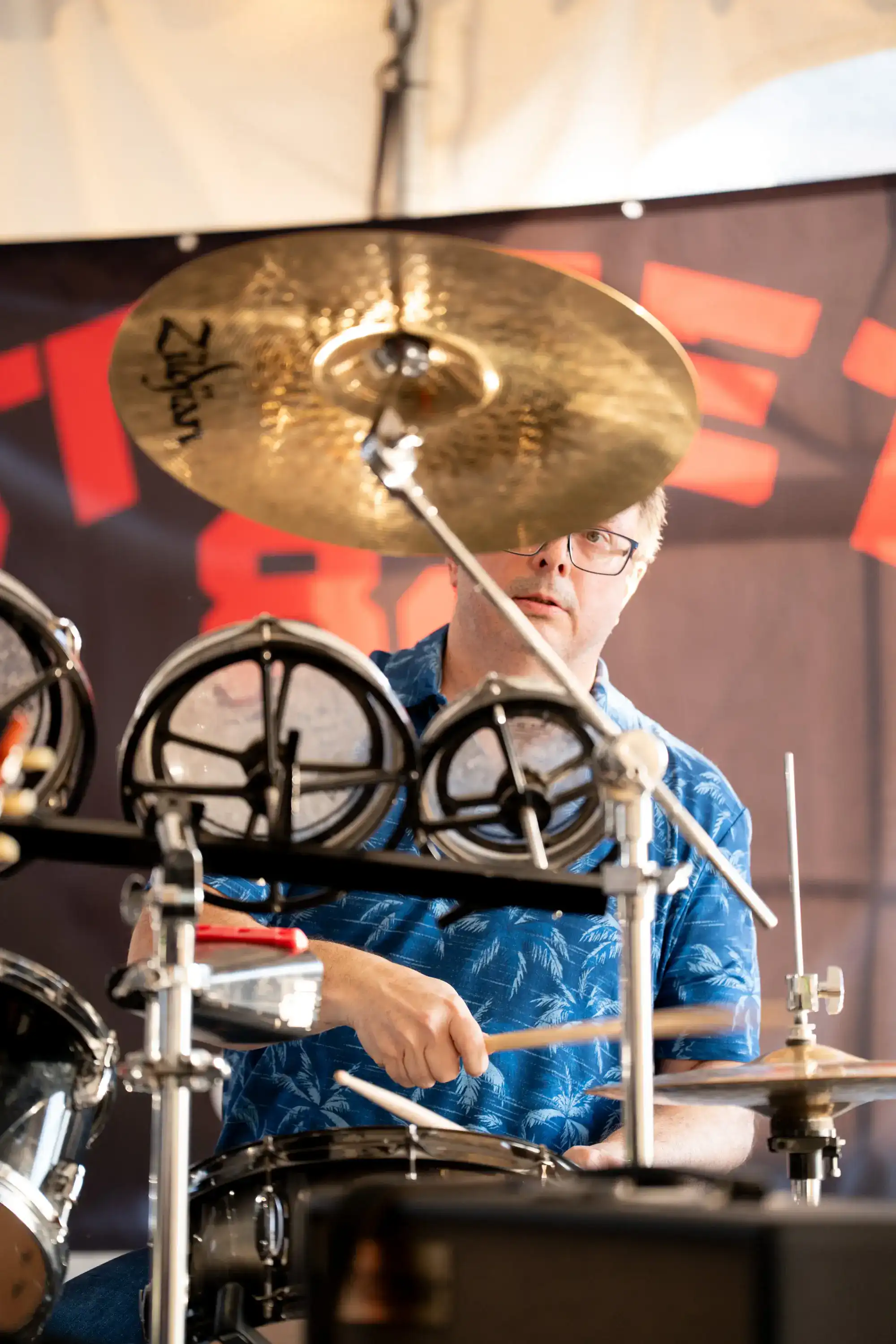 Drummer performing live music at The Original Charbroil House